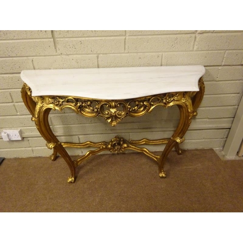 70 - A gilt console table with shaped marble top. W. 130cm, D. 50cm., H. 83cm approx.