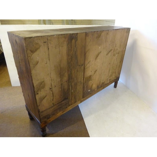 72 - Large old timber cabinet, the upper section having 24 sections over 2 long drawers and raised on tur... 