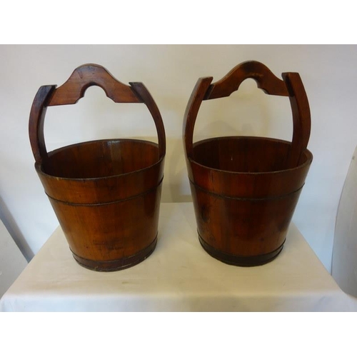 76 - Pair of decorative timber well buckets. Diameter 40cm, Height to top of handle 60cm, approx.