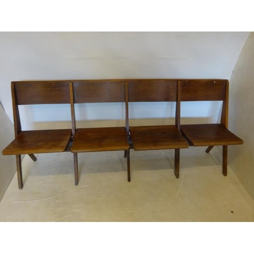 78 - An antique timber four seat folding bench. W. 190cm.