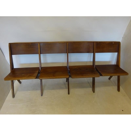 79 - An antique timber four seat folding bench. W. 190cm.