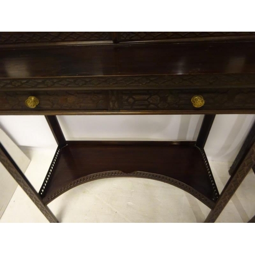 80 - A pair of Edwardian mahogany neat size drawing room cabinets, the upper section having decorative ti... 