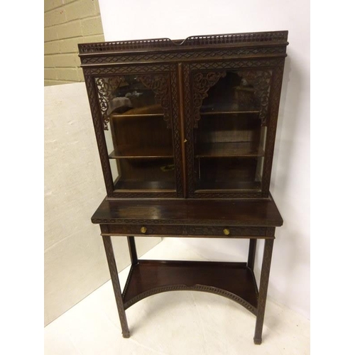 80 - A pair of Edwardian mahogany neat size drawing room cabinets, the upper section having decorative ti... 