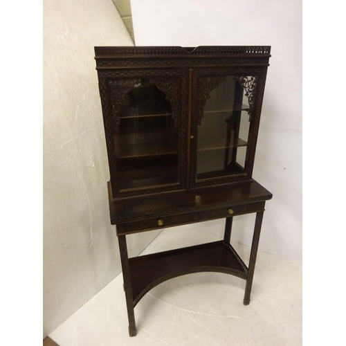 80 - A pair of Edwardian mahogany neat size drawing room cabinets, the upper section having decorative ti... 