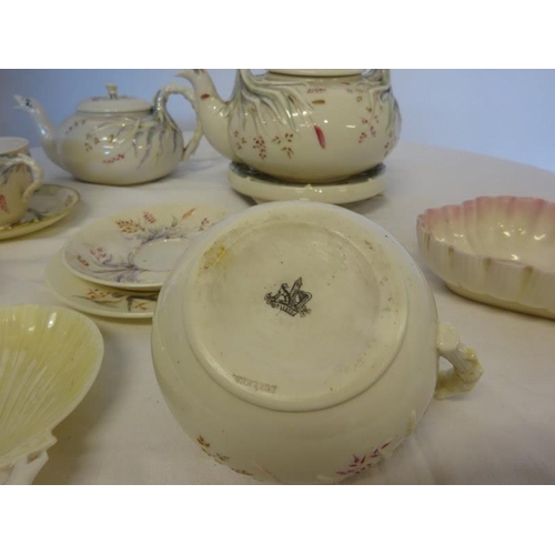 85 - A collection of early Belleek, 2 teapots, 1 teapot stand, 3 saucers, 2 cups and 1 side plate - all f... 