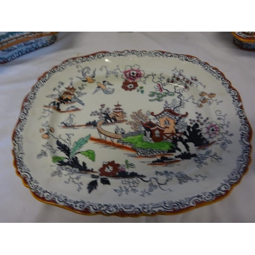 97 - A lot of Victorian Ashworth china tureens and platters.