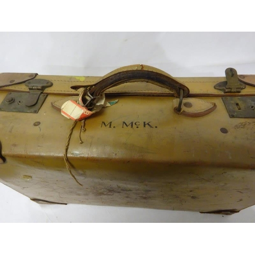 99 - Old leather suitcase with initials M. Mc. K.