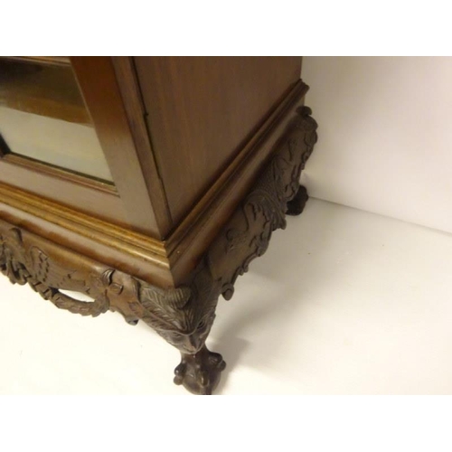 100 - An excellent quality Irish mahogany bookcase, the upper section having dental cornice over sectioned... 