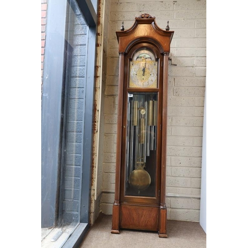 104 - American/German - A fine early 20th century long cased clock, having arched brass dial and moon move... 