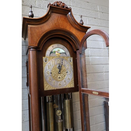 104 - American/German - A fine early 20th century long cased clock, having arched brass dial and moon move... 