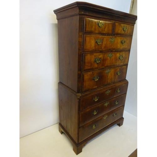 108 - A good early Georgian walnut chest on chest, the upper section fitted with 2 short & 3 long drawers,... 