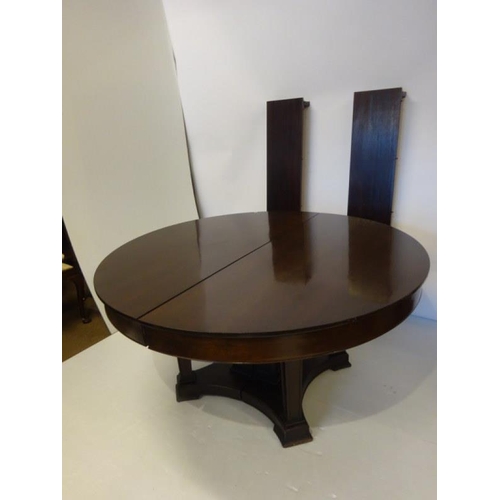 110 - A fine large antique circular mahogany dining table on centre pod support with 2 additional leaves. ... 