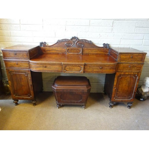 111 - A Regency mahogany drop centre sideboard having nicely carved back panel, the centre section fitted ... 