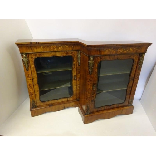 120 - A good pair of Victorian walnut and marquerty inlaid side cabinets having shaped doors and plinth ba... 