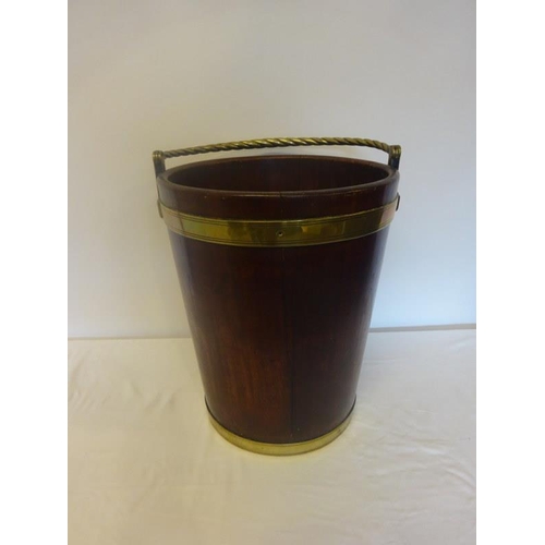 125 - A very good large Irish Georgian mahogany and brass banded turf bucket with rope twist handle. H. 46... 