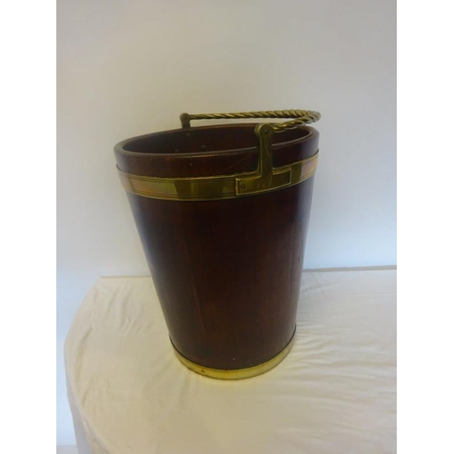 125 - A very good large Irish Georgian mahogany and brass banded turf bucket with rope twist handle. H. 46... 