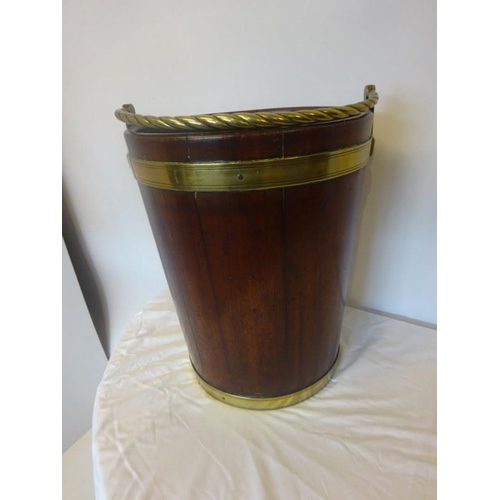 125 - A very good large Irish Georgian mahogany and brass banded turf bucket with rope twist handle. H. 46... 