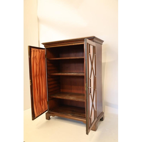 126 - Victorian mahogany cabinet having sectioned glass doors, shelved interior and raised on bracket feet... 