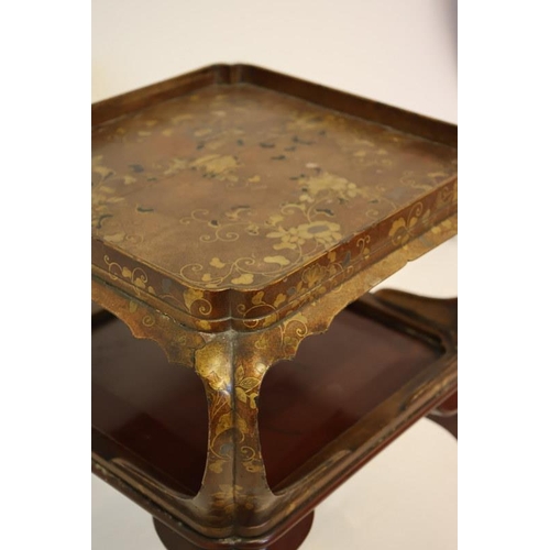 131 - Howard Berners Street, a two tier lacquered occasional table on decorative legs, stamped. H. 67cm, D... 