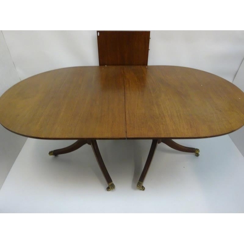 135 - Mahogany twin pod dining table with spare leaf. L. 183cm, W. 96cm, closed. Width of leaf 50cm, (lack... 