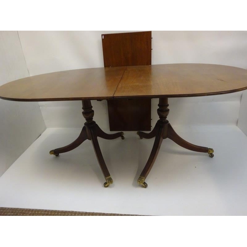 135 - Mahogany twin pod dining table with spare leaf. L. 183cm, W. 96cm, closed. Width of leaf 50cm, (lack... 