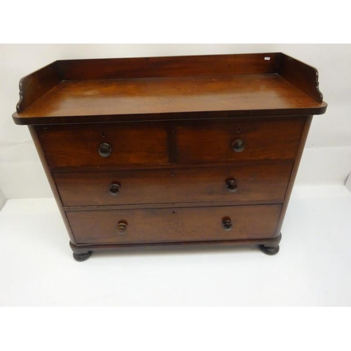 137 - Victorian mahogany tray back chest of 2 short and 2 long drawers. W. 114cm, D. 50cm, H. 80cm.