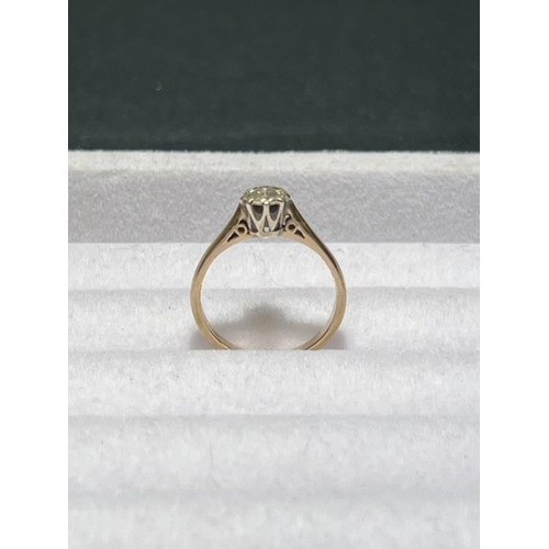 170 - 9ct yellow gold diamond solitaire ring. Size M/N.