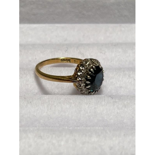 171 - 18ct yellow gold diamond and sapphire cluster ring. Size M/N.