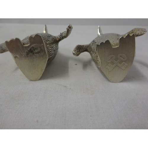 187 - A pair of silver plated cruets in the shape of penguins.