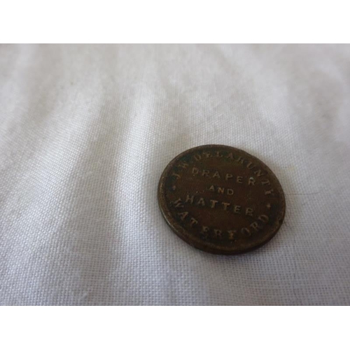 204 - Waterford interest - A rare old Waterford city token, J. W. Delahunty Draper-Hatter, Waterford.