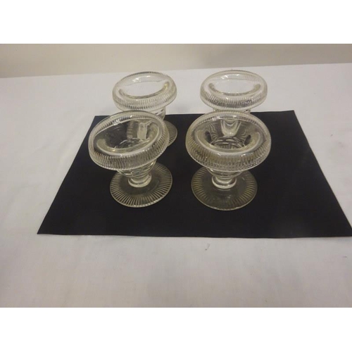 225 - A set of 4 early antique glass circular salts in excellent condition.