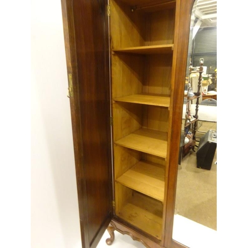 232 - Waring & Gillow - A good Edwardian mahogany wardrobe having bevelled glass full length mirror and th... 