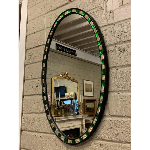 239 - Fine antique Irish oval shaped hall mirror with green and clear glass studs.