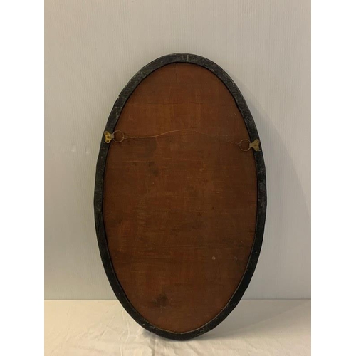 239 - Fine antique Irish oval shaped hall mirror with green and clear glass studs.