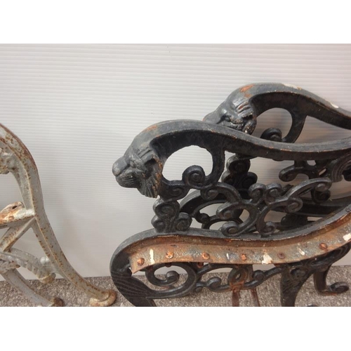 241 - Three pairs of old iron garden seat ends.