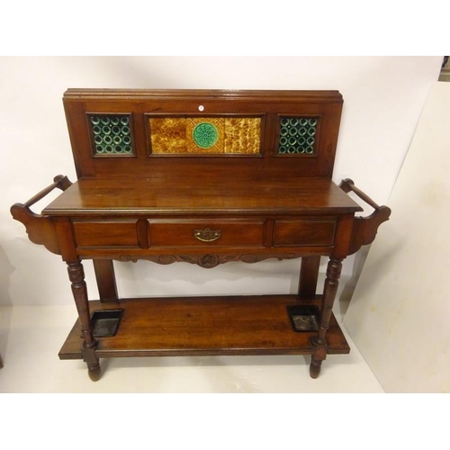 257 - Edwardian mahogany hall table/umbrella stand having decorative tiled insets fitted with a drawer. W.... 