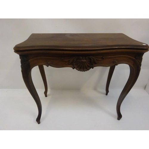 285 - Victorian rosewood fold over card table raised on cabriole legs. W. 83cm, D. 43cm, H. 75cm approx.