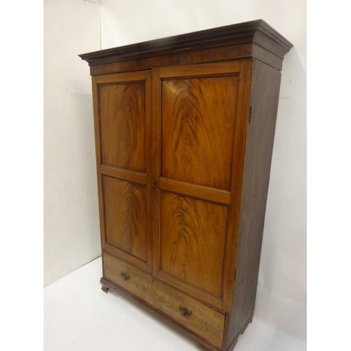 288 - Antique mahogany 2 door wardrobe, the base fitted with a drawer. W. 130cm, D. 55cm, H. 190cm approx.