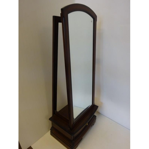 33 - A mahogany cheval dressing mirror the base fitted with a drawer. H. 164cm, W. 60 cm approx.