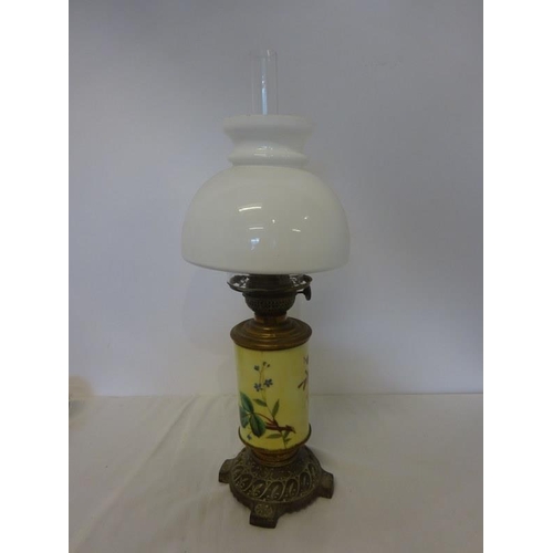 331 - Old porcelain and metal oil lamp with white glass shade.