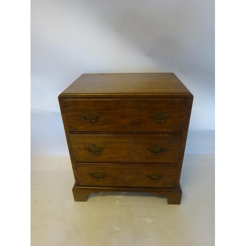 348 - Neat sized walnut chest of three drawers on bracket feet. 
W. 57cm, D. 39cm, H. 65cm.