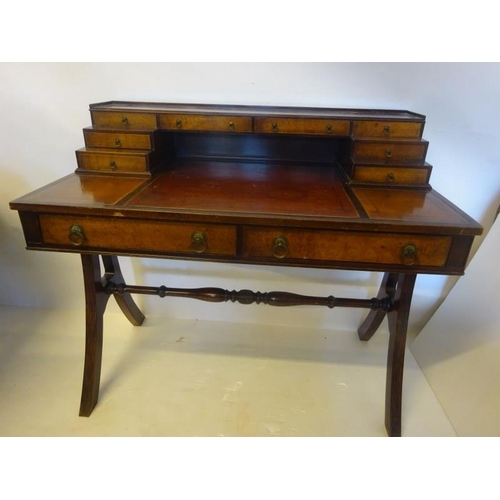 349 - Mahogany and maple wood writing desk, the rectangular shaped top fitted with drawers and leather wri... 