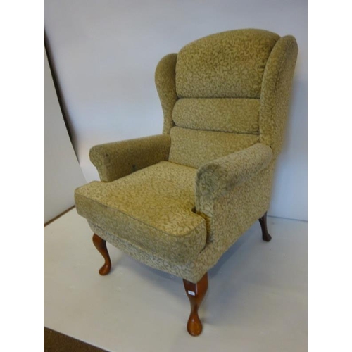 35 - Drawing room armchair raised on Queen Anne style legs.