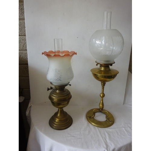 358 - Two brass oil lamps.