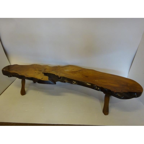 36 - A long timber shaped hall table (made from a tree that fell in the estate). L. 222cm, H. 42cm.