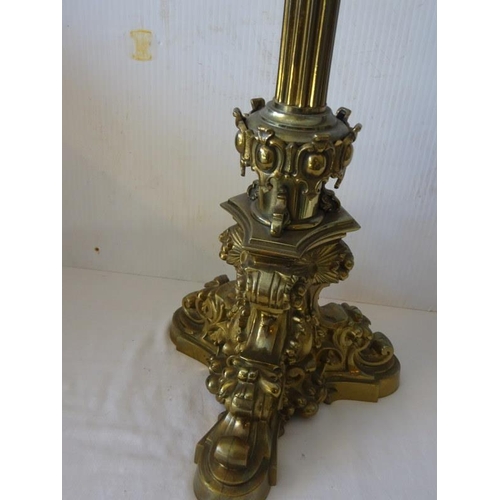 361 - A tall decorative brass column oil lamp with clear glass bowl and etch shade.