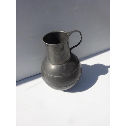 369 - Large old Pewter jug with handle. H. 50cm.