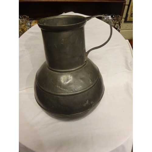 369 - Large old Pewter jug with handle. H. 50cm.