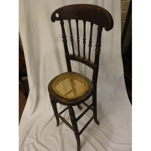 374 - A rare child's bentwood tall seat. H. 96cm.