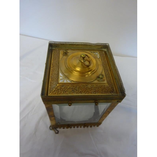 50 - Old brass framed and bevelled glass hall lantern. 1 glass panel has a crack. H. 30cm, W. 20cm